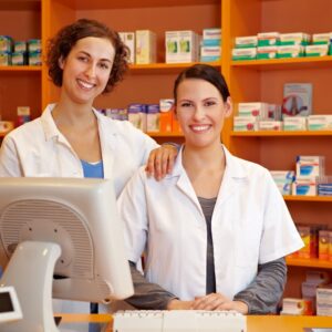 2 female pharmacists smiling