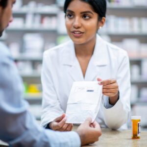 Image of a woman explaining a prescription to a customer
